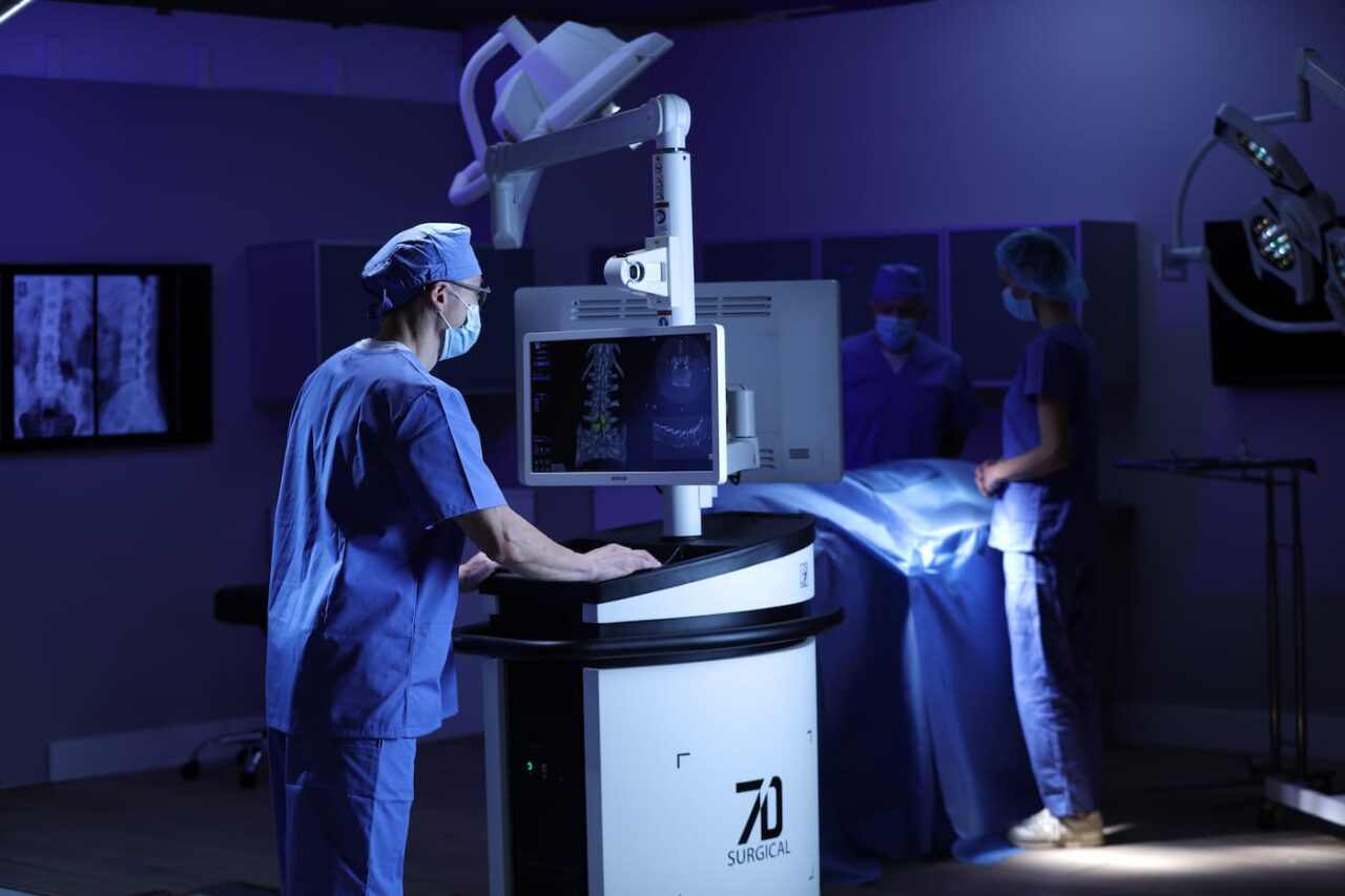 Surgeons using 7D surgical system